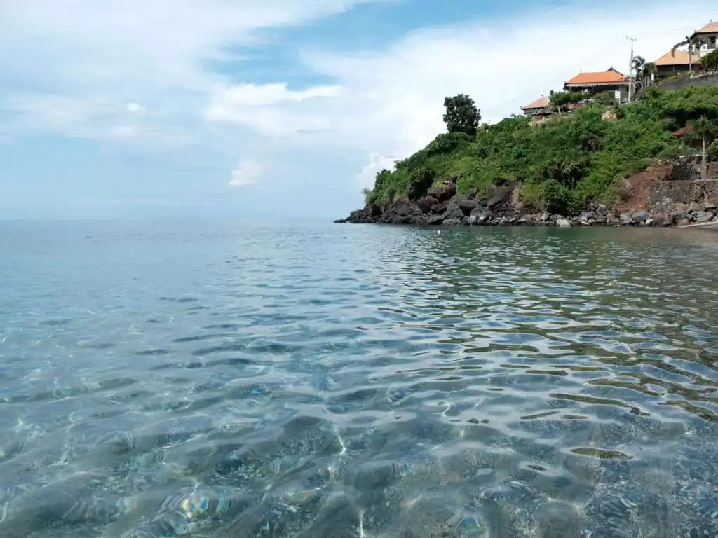 Lipah beach calm water and local warung, Amed Bali east coast
